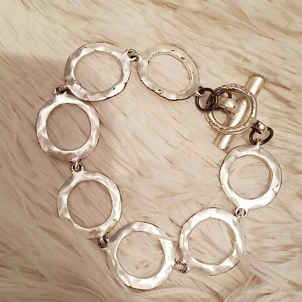 Kenneth Cole silvertone circle toggle bracelet